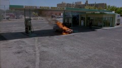 Walt drives in his car and stops at a gas station.