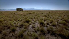 Jesse and Badger cook in the desert.