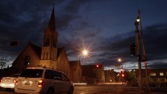 Timelapse of an intersection near a church.