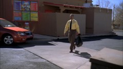 Gus talks to Mike outside his restaurant.