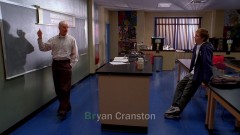 End of the song, back to the action! Walt is in his classroom.