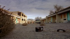 Walt drives to an abandoned motor lodge.