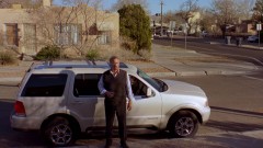 Jane's dad waits for Jane outside her apartment.