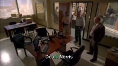 Walt visits Hank in the office.