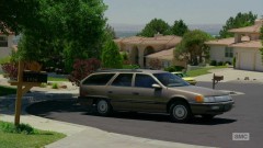 Saul watches Mrs. Kettleman leave her house.