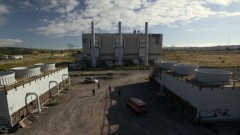 Mike has a meeting at an abandoned power plant.