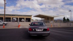 A Mexican truck driver crosses the US border