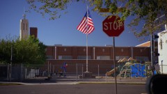 Jimmy tries to shoot a video at a school