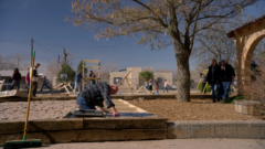 Mike is doing volunteer work with the church group