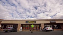 Jimmy paints the windows at CC Mobile