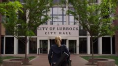 Kim goes to city hall at Lubbock