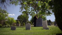 James goes to his brother's grave