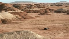 Todd and Jesse bury a body in the desert