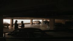 Saul meets with Kevin at a parking garage
